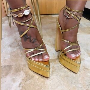 Gold platform heels